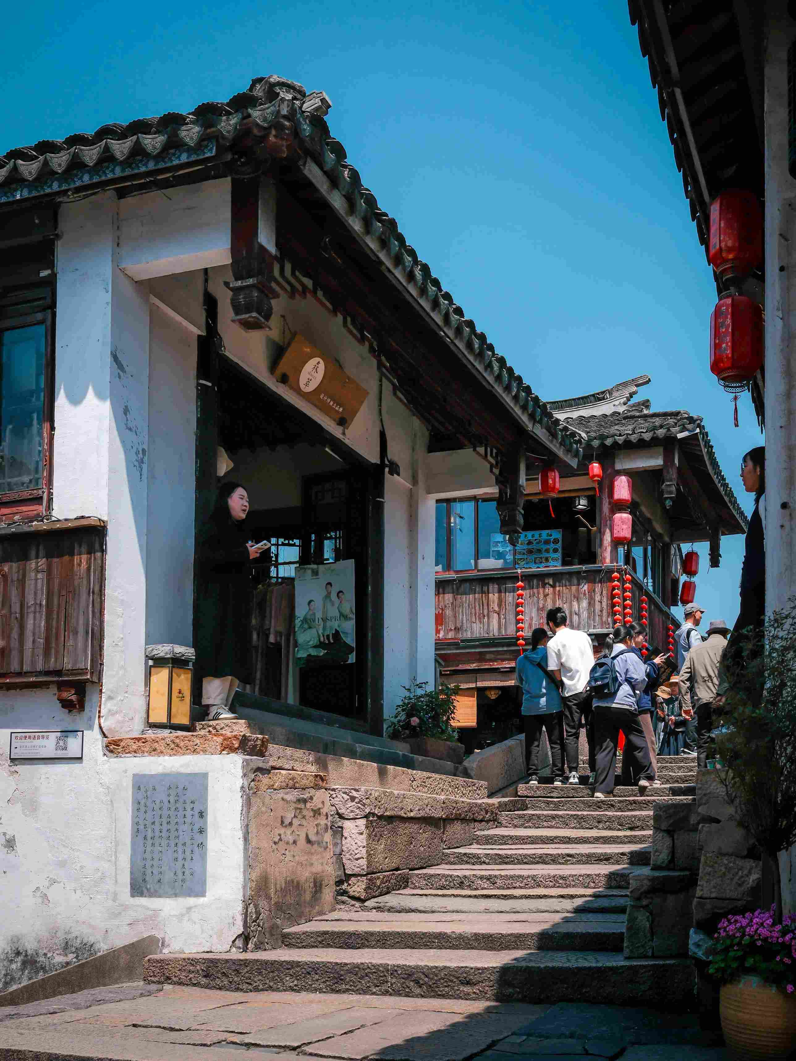 Fenghuang ancient town with lanterns and old streets beneath a bright sky