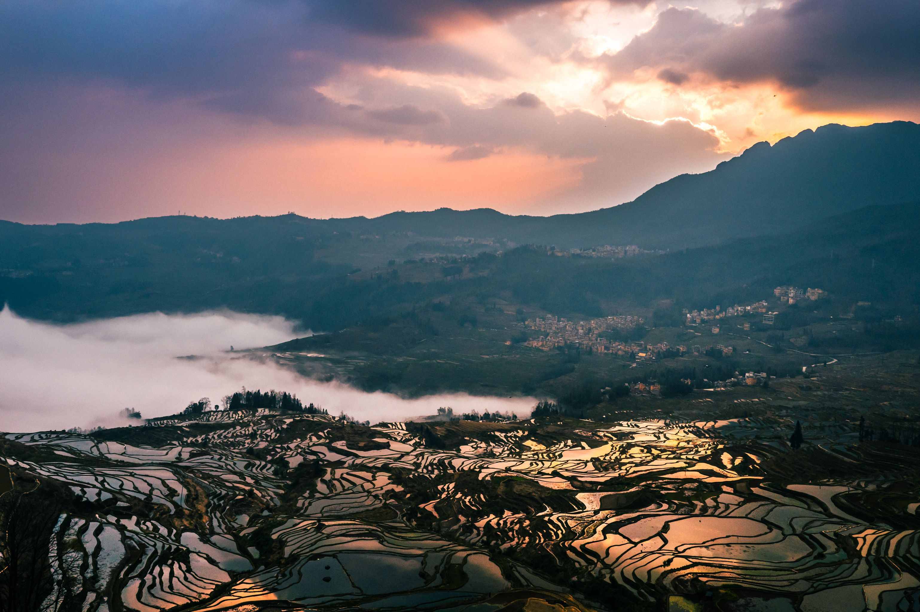 Yunnan terraced rice fields carved into mountains