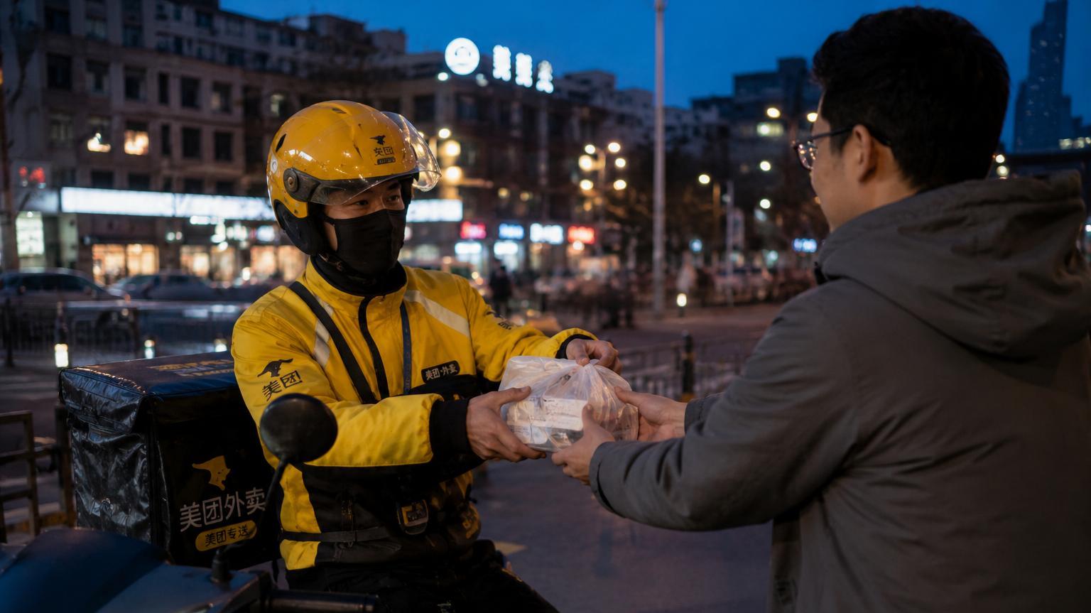 Delivery rider with a bag of medicine on a scooter in China