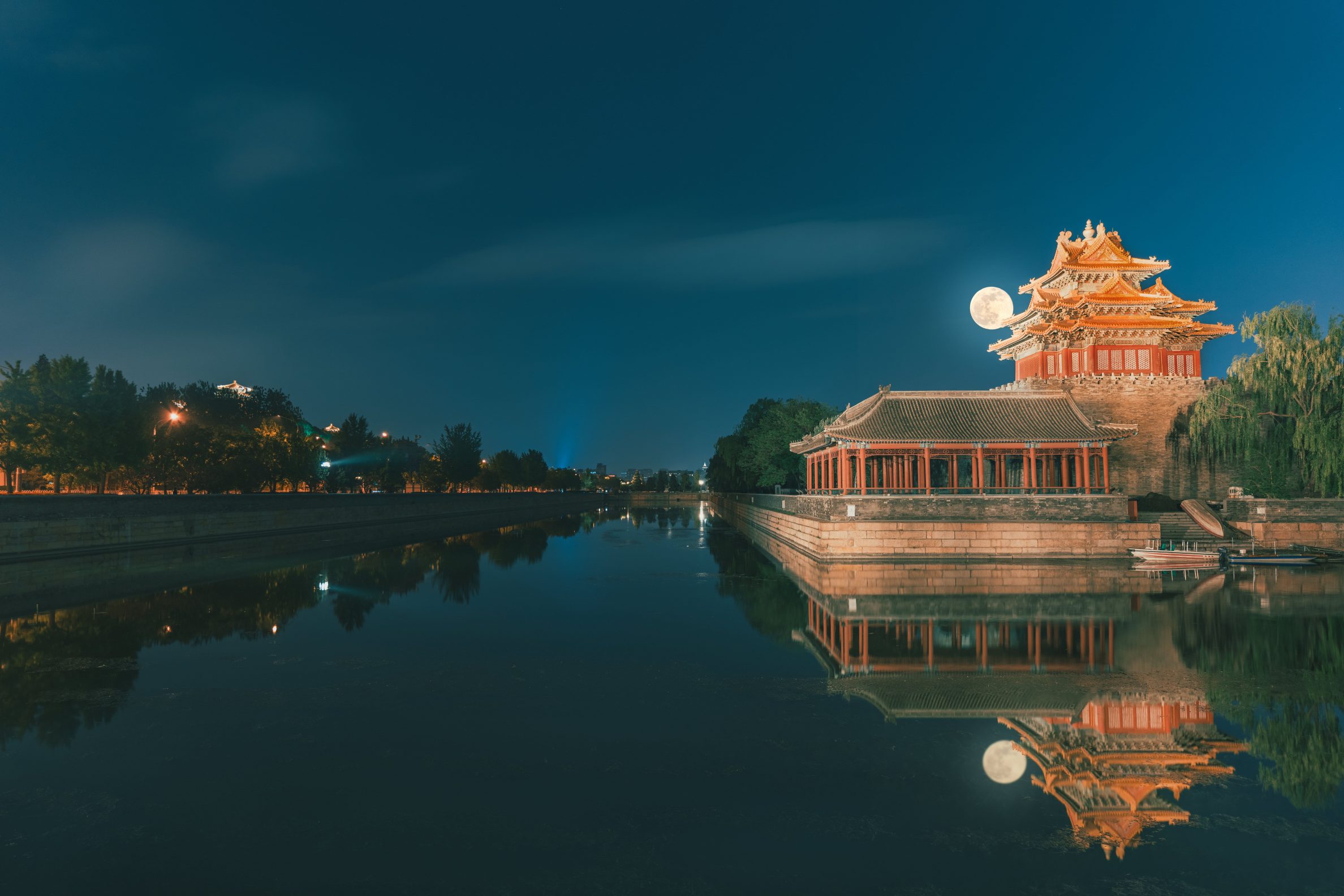 Forbidden City palace architecture at sunset with golden roof tiles, Beijing, China