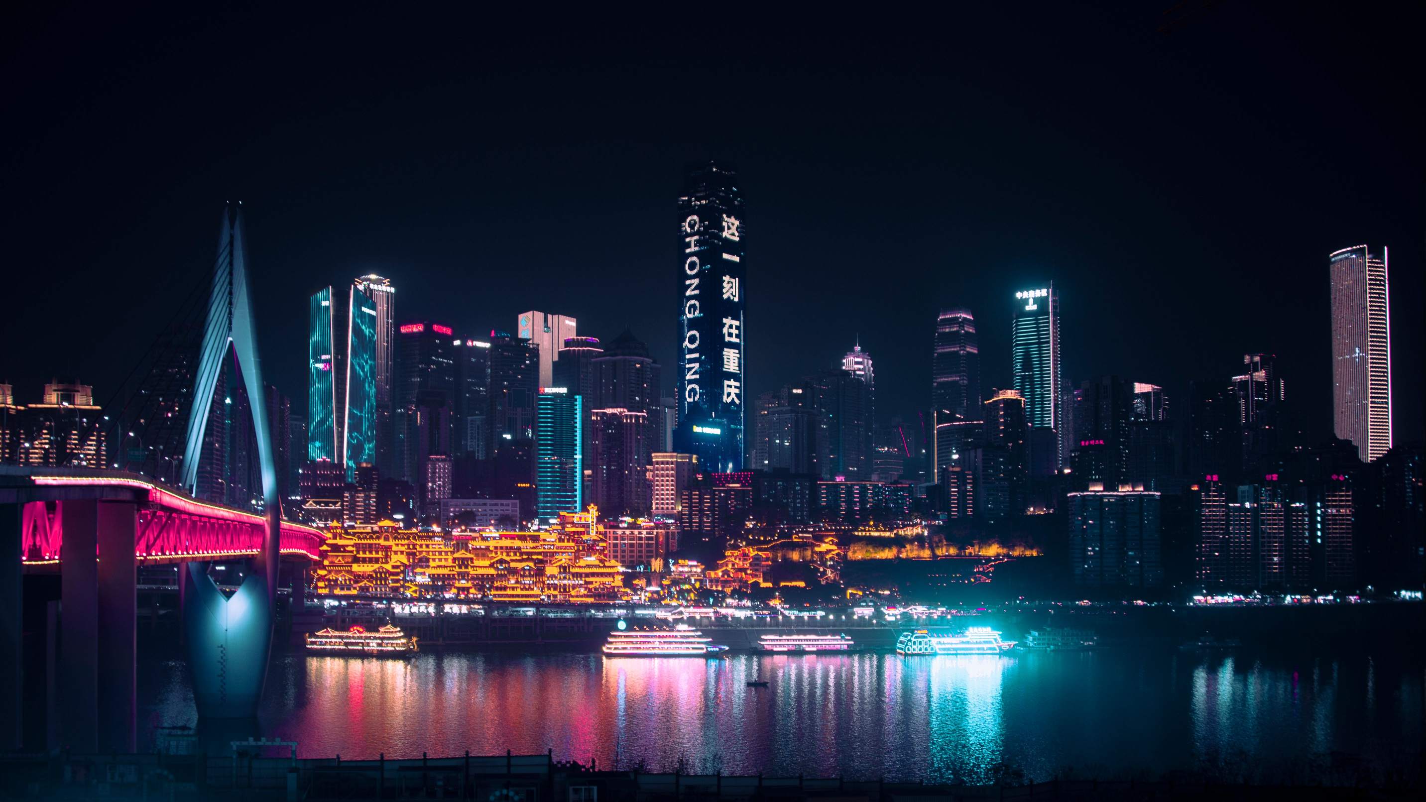 Hongyadong stilt houses lit up at night in Chongqing, China
