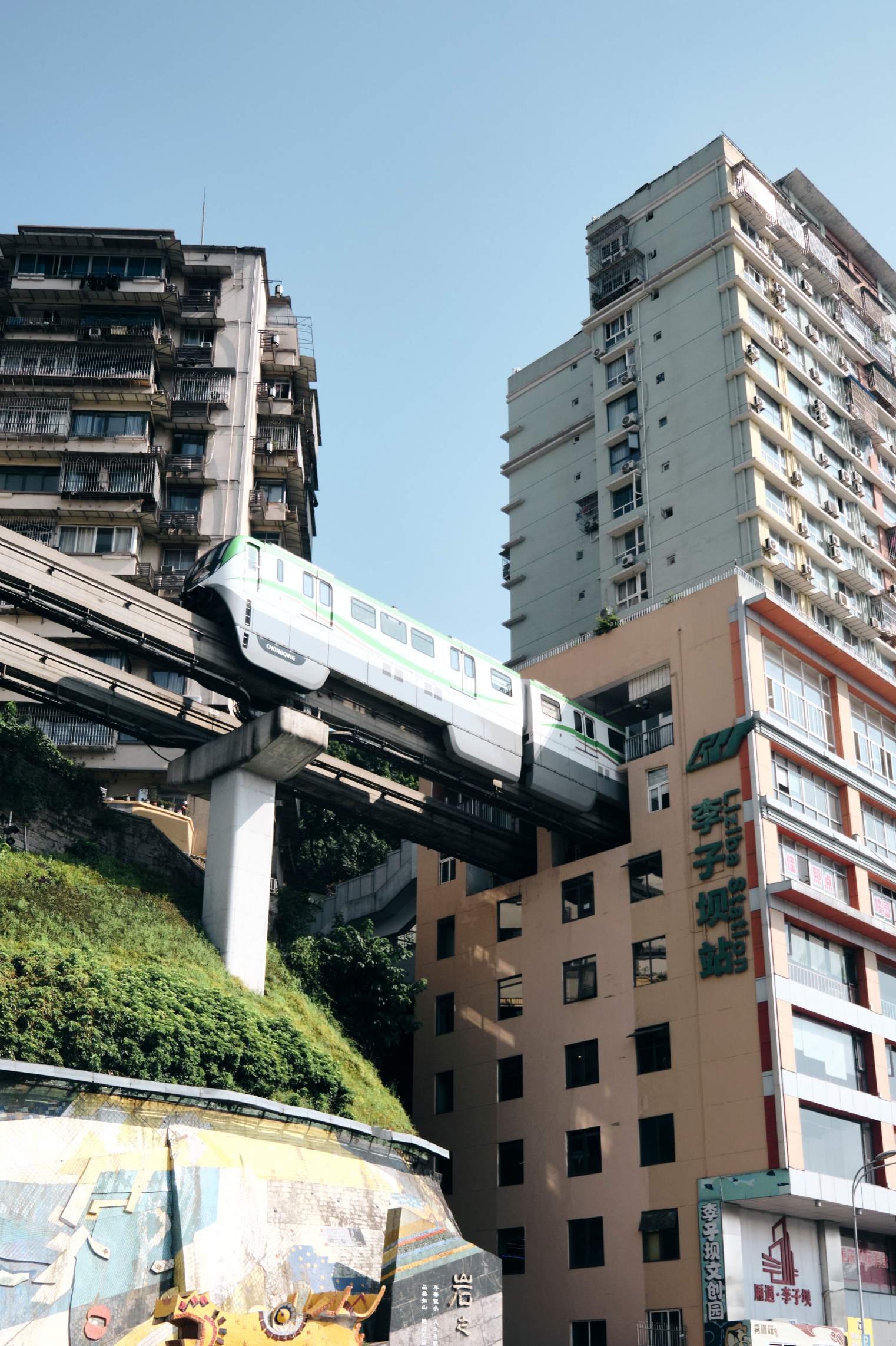 Monorail passing through a residential building in Chongqing, China